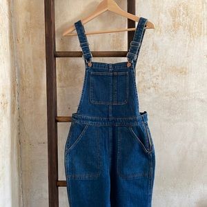 Denim bell bottom overalls.